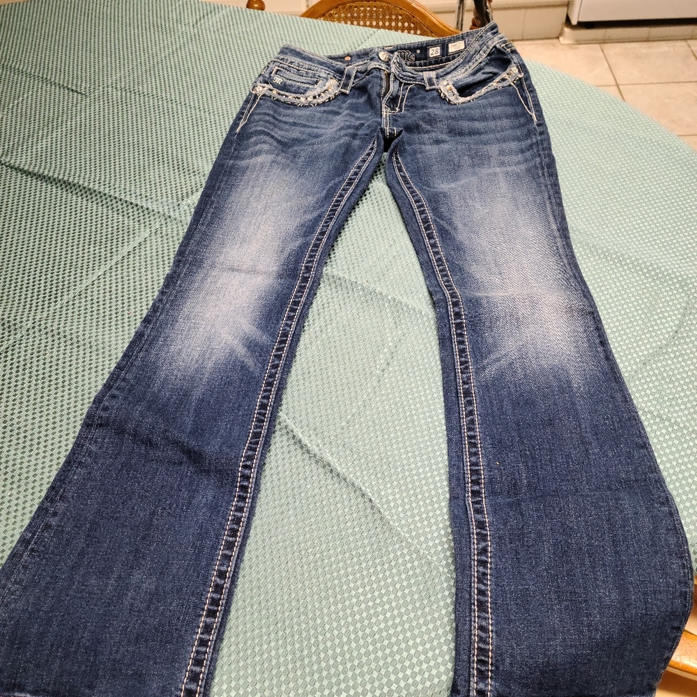 Miss Me jeans.  3 pairs Size 28